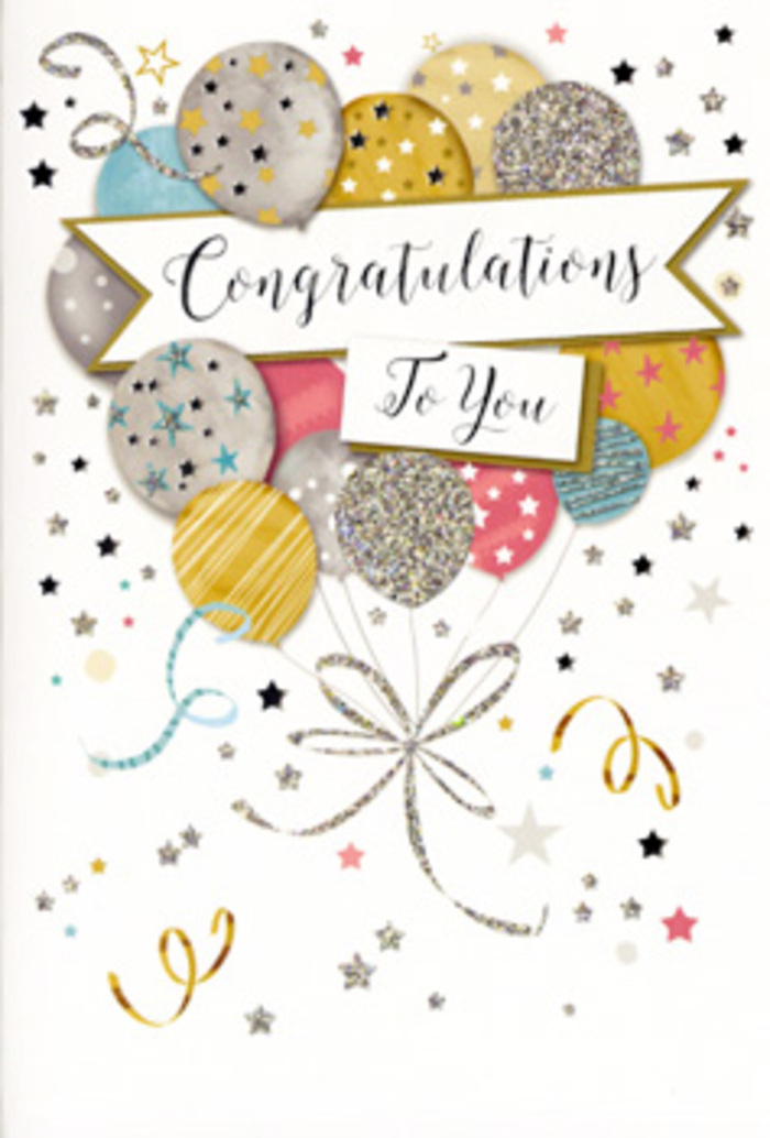 The scene shows a refined congratulations card, the kind you might pair with a fresh, celebratory bouquet delivered to a doorstep near Stepney Green Park. The illustration focuses on a cluster of floating balloons gathered in the middle of the card, their shapes softly rounded and overlapping in a way that feels both playful and composed. Each balloon is coloured in a palette of champagne gold, brushed silver, muted rose pink, pale sky blue, and gentle grey, with accents of ivory that keep the whole arrangement light. Their surfaces carry a mix of patterns-glittering stripes, tiny stars, scattered dots-suggesting the glimmer of metallic ink and fine glitter that would sparkle slightly as you move the card in your hand. Thin, flowing ribbons trail from the base of the balloons, drawn in shimmering gold and silver tones that curl downward like the decorative ties on a hand-tied bouquet. Surrounding the central design, the soft background is dusted with swirling lines, confetti specks, and twinkling stars, evoking the energy of a surprise celebration in a cosy Stepney flat or a small family gathering after an exam result. A graceful banner unfurls across the centre, carrying the message "Congratulations To You" in elegant, looping calligraphy, the sort of script that feels personal and considered. You can almost sense the weight of the quality cardstock and the slight texture where the glitter sits, inviting fingertips to trace the design. The overall impression is one of gentle glamour and heartfelt pride, perfectly suited to marking promotions, graduations, and milestone achievements for friends and family across Stepney.